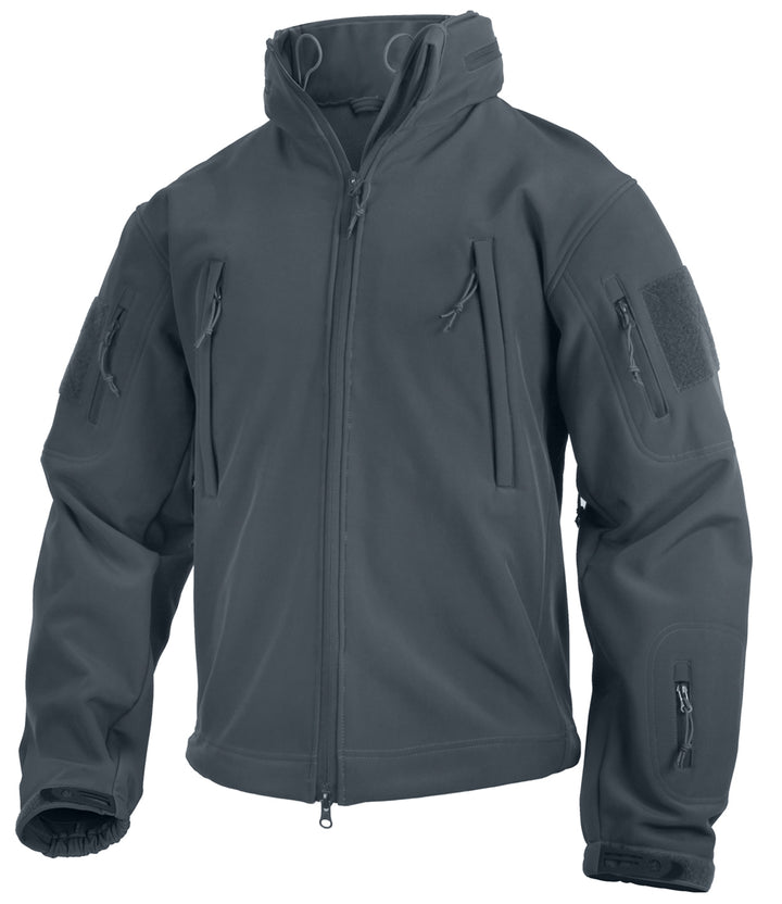  GS-006 Gray Soft Shell Jacket shown upright against white background, featuring multi-zippered chest and sleeve pockets, high collar, Velcro sleeve patches, and adjustable cuffs; designed for water-resistant performance and modular field utility across urban, range, or outdoor environments
