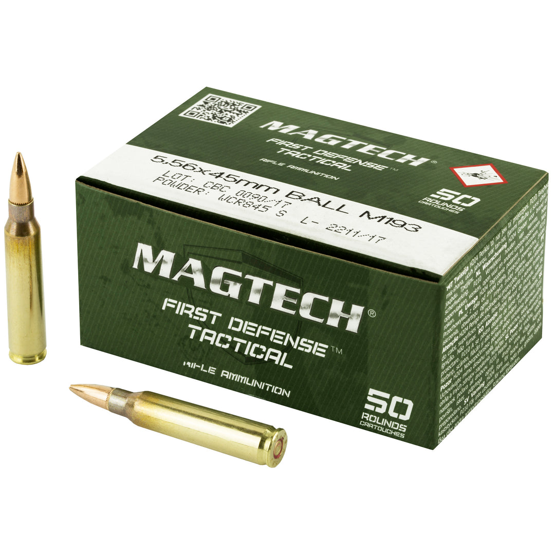 GS-017 Magtech 5.56x45mm Ball M193 Ammunition Box with upright and horizontal rounds placed on white background; features green “First Defense Tactical” branding with QR code and visible labeling for 55-grain FMJ cartridges, ideal for training and tactical range deployment